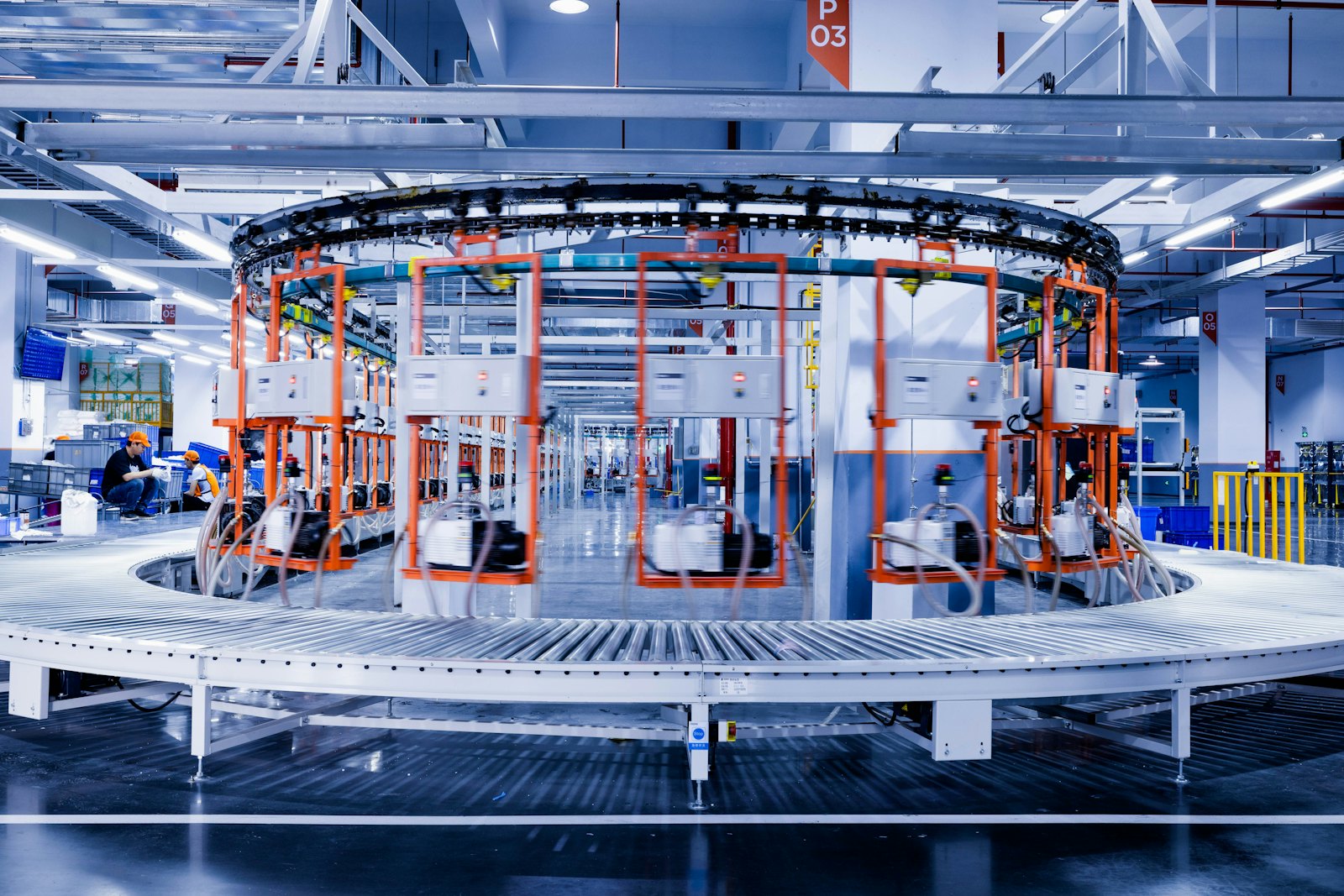 Automated production and inspection line inside a modern manufacturing facility