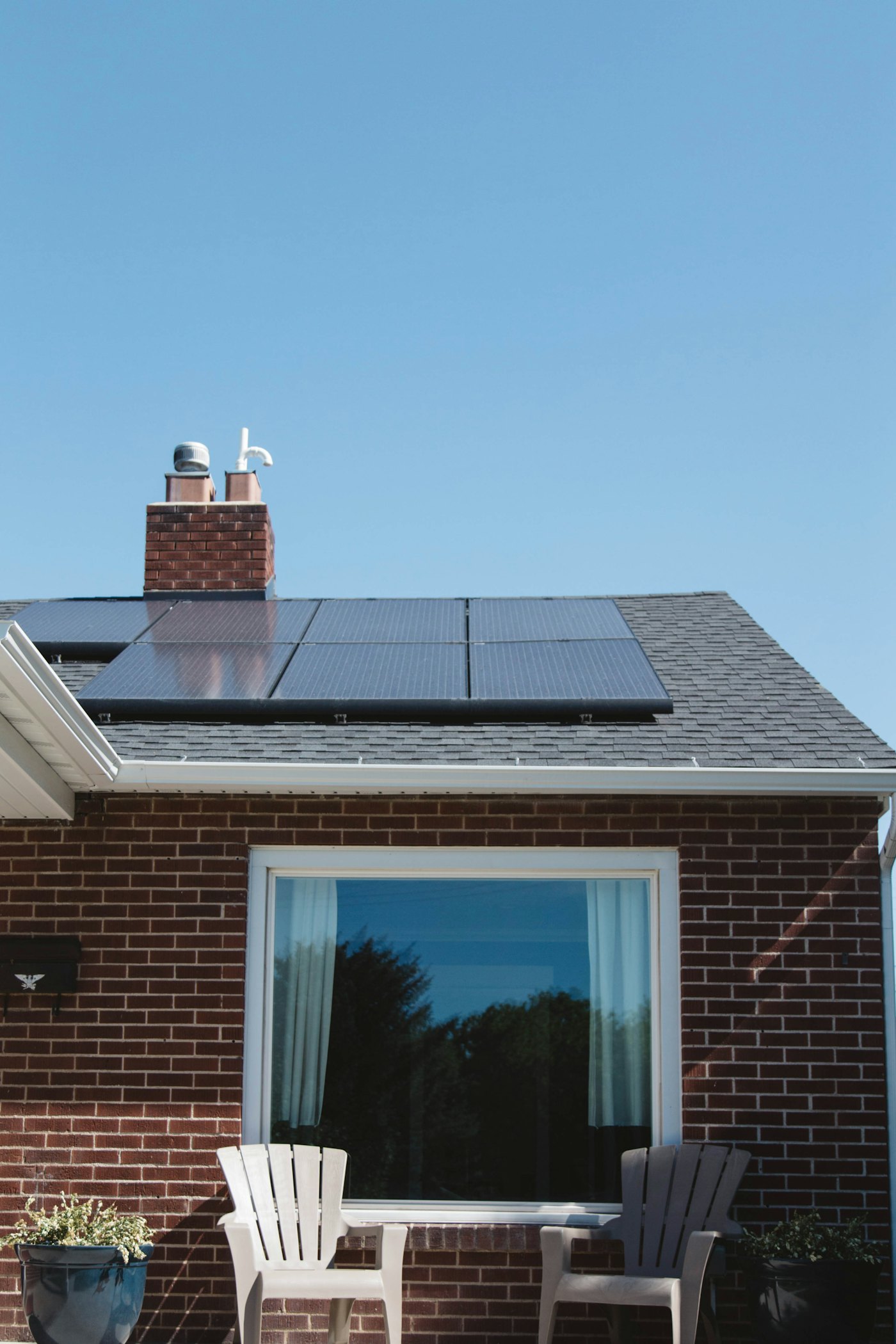 Solar panels installed on the roof of a family home